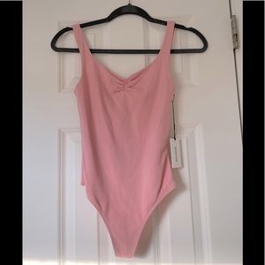 Aritzia never-worn pink bodysuit